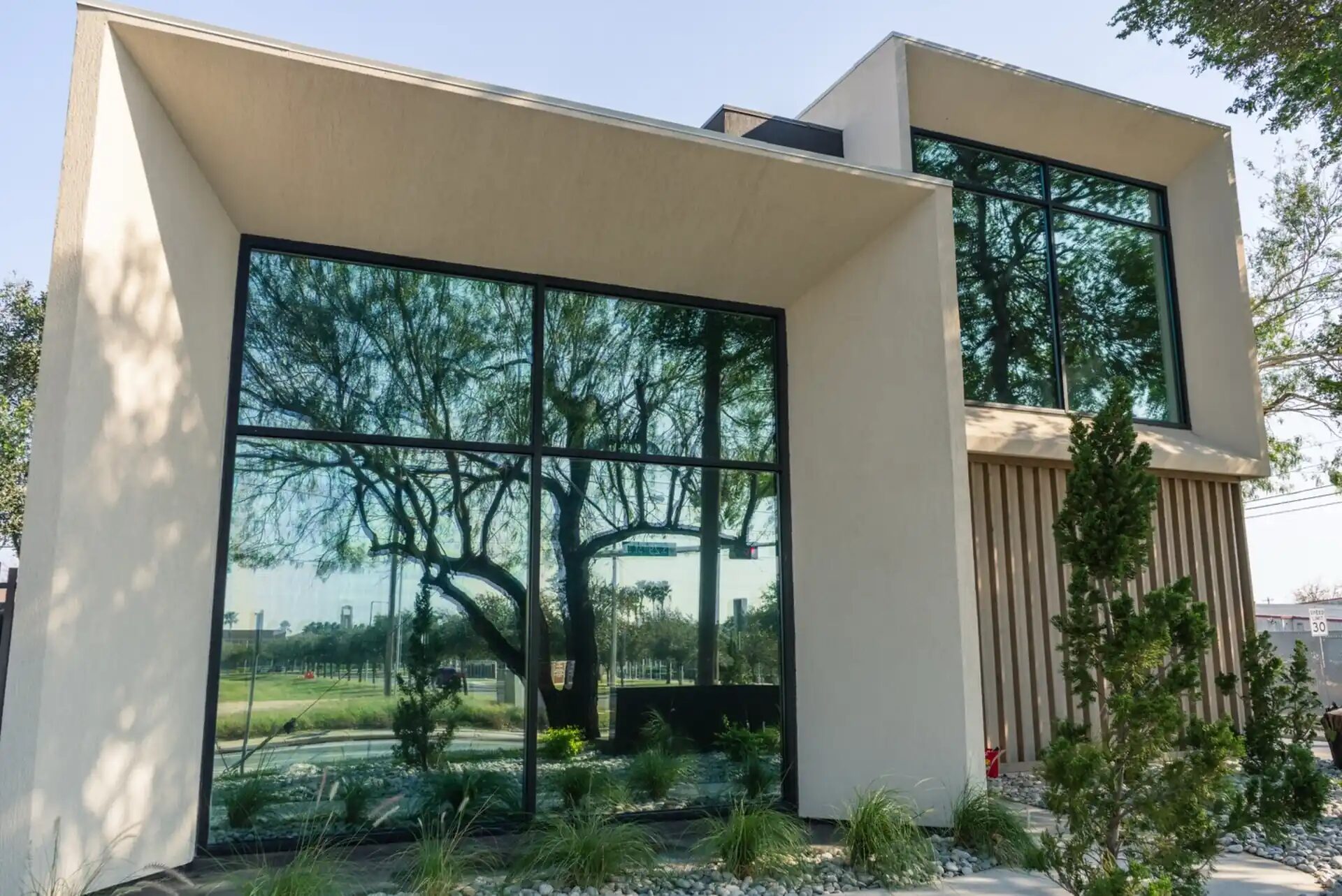 Architectural tempered glass window wall with angular framing