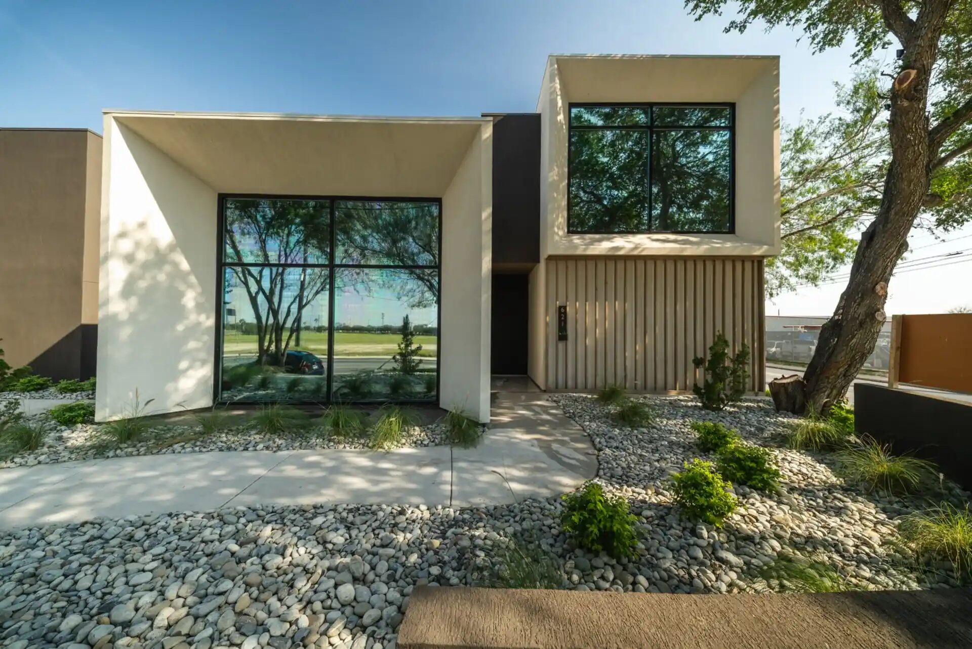 Modern residence with full-height tempered window system